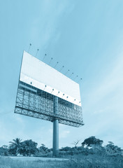 Billboard / View of empty billboard for advertisement. Blue tone.