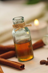 Essential aroma oil with cinnamon and coffee beans
