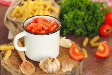 Tomato sauce with ingredients for pasta