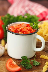 Tomato sauce with ingredients for pasta