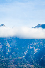 Clouds on mountain tops.  Mountain landscape with clouds. mounta