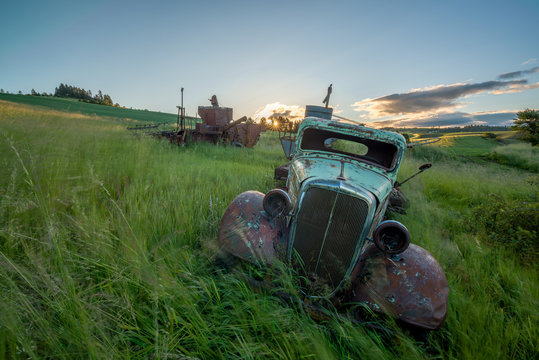 Grasses Blow In The Wind With Rusted Old Farm Truck