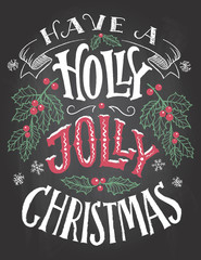Have a holly jolly Christmas. Vintage hand lettering on blackboard background with chalk. Holiday chalkboard typography