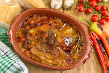 Cooked beans in a traditional pottery bowl