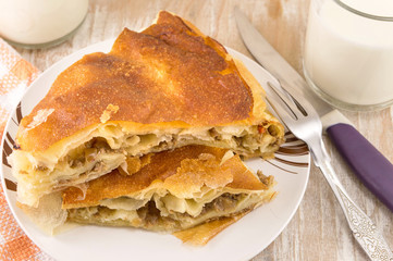 Cheese pie with a yogurt on a plate