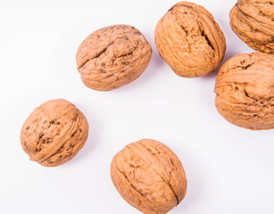 Walnuts on a white background