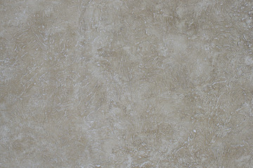 Decorative plaster effect on wall.