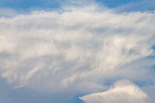 Texture of wave pattern white cloud on blue sky