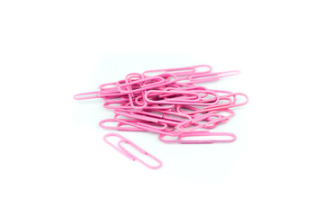 Pink paper clips isolated in white background