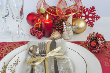 Beautifuly decorated table ready for christmas dinner