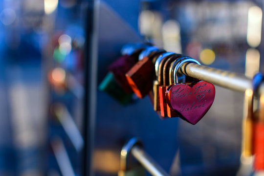 Love padlocks or love locks on a bridge in the harbor of hamburg on blurred sunlight background , love, paris, locks, lock, symbol, heart, white, romance, lifelong, padlock, red