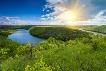 The scenic summer landscape. View of bend of the river. Panoramic view from the hill. 