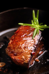 Beef steak on cast iron skillet