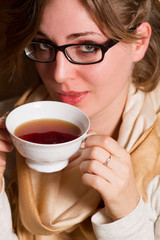young woman drinking tea