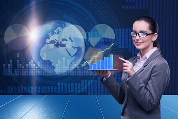 Businesswoman in stock trading business concept