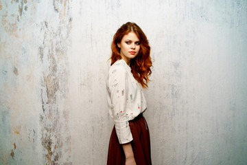 Fototapeta premium Young female model. Woman vintage. Vintage clothing. vintage hairstyle 