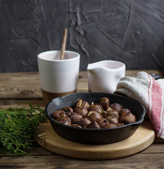 Roasted chestnuts in skillet