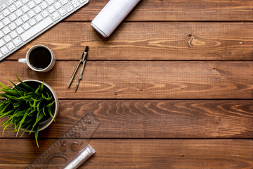 constructor wooden working desktop with drawings apartments top view