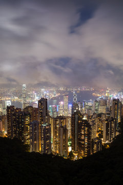 Hong Kong's famous skyline viewed from the Victoria Peak in the evening. Copy space.