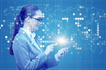 Businesswoman with mobile in business concept