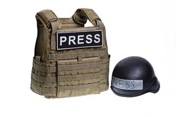 Body armor and helmet for journalis isolated/Bulletproof vest and helmet with inscription "PRESS" isolated on white background