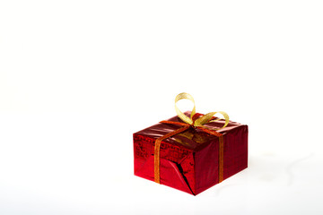 Gift box in colored box on a white background