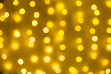 Defocused gold abstract Christmas Glitter Lights bokeh Background