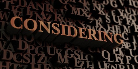 Considering - Wooden 3D rendered letters/message.  Can be used for an online banner ad or a print postcard.