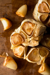 Roast Garlic on Rustic Wood Cutting Board