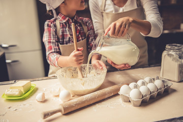 Mom and daughter baking