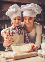 Mom and daughter baking