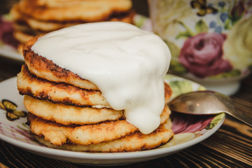 Cheesecakes and Cup on wooden table