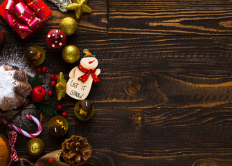 Fototapeta na wymiar Mini panettone with fruits and Christmas decoration,