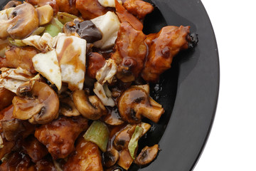 Chinese food. Chichen in soya sauce and vegetables