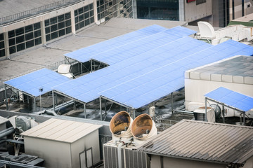 Solar cell panel on the rooftop of office or factory building.Solar energy concept.