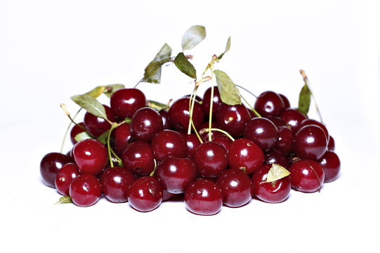 Red ripe cherry berries isolated