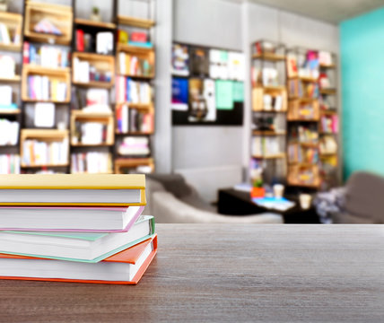 Stack Of Books On Table At Library