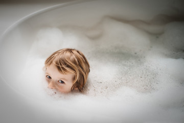 Boy in bubble bath