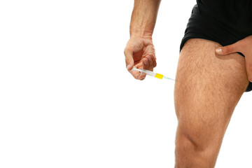 Muscular man injecting steroids, closeup