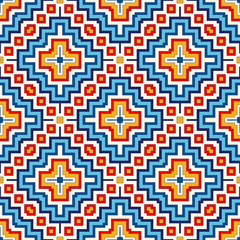 Obraz premium Bright seamless pattern with symmetric geometric ornament. Colorful abstract background. Ethnic and tribal motifs.