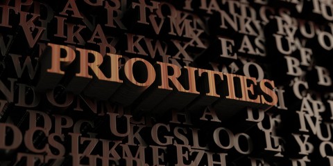 Priorities - Wooden 3D rendered letters/message.  Can be used for an online banner ad or a print postcard.