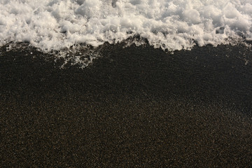Sea wave and the gray sand! Beautiful coast!