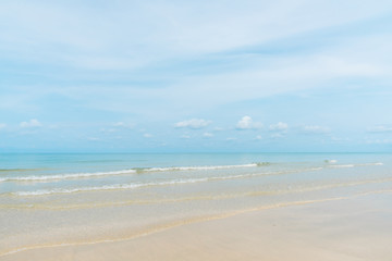 Fototapeta na wymiar Beautiful gentle wave on the tropical beach