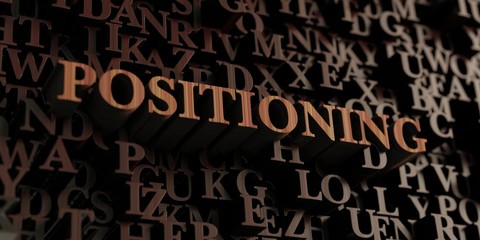 Positioning - Wooden 3D rendered letters/message.  Can be used for an online banner ad or a print postcard.