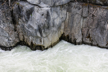 Naklejka premium Waterfall during a sunny day. Nairn Falls Provincial Park, British Columbia, Canada