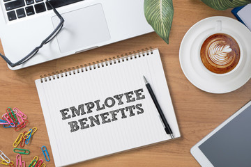 EMPLOYEE BENEFITS Man working on tablet TECHNOLOGY COMMUNICATION
