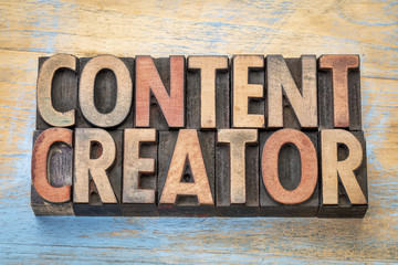 content creator  words in wood type