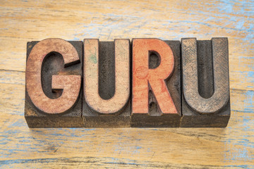 guru word in wood type