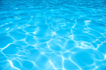 Naklejka na ściany i meble Ripple Blue water surface in pool