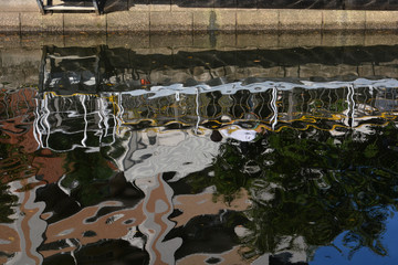Tokyo, Meguro River; Building's shadow on the water